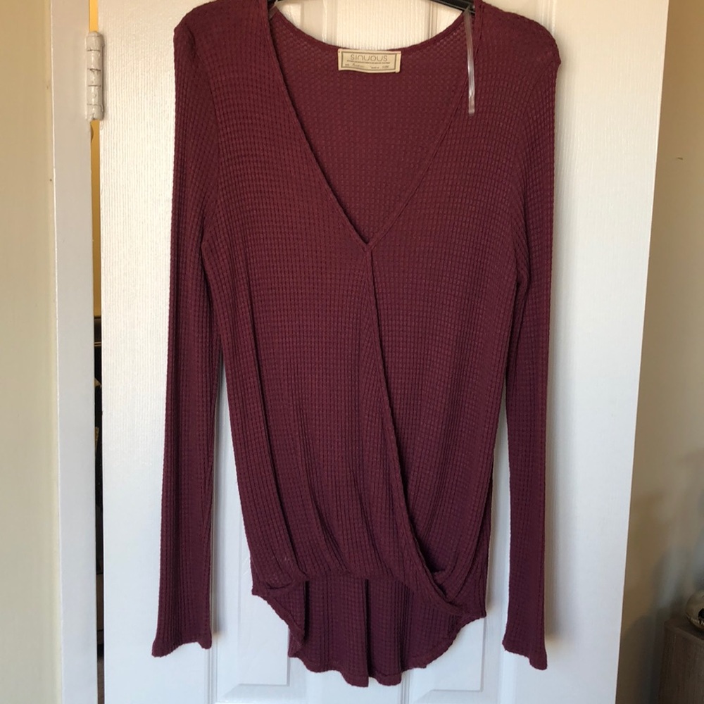 Maroon long sleeved V neck tee size medium.